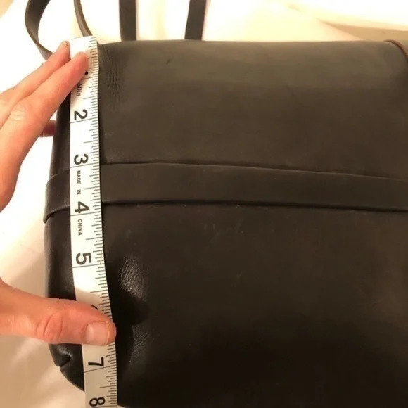 FAUSTO SANTINO black leather sling bag